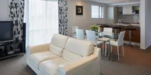 Focus Motel Penthouse lounge, dining and kitchen areas