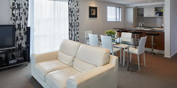 Focus Motel Penthouse lounge, dining and kitchen areas